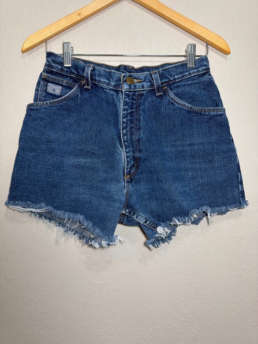 Vintage Wrangler women’s denim shorts raw frayed hem classic blue wash